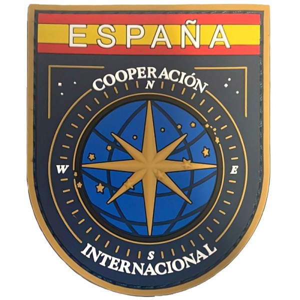PARCHE GOMA DISTINTIVO FUNCION DE LA DIVISION DE COOPERACION INTERNACIONAL DE POLICIA NACIONAL 8,5 x 7 cm.